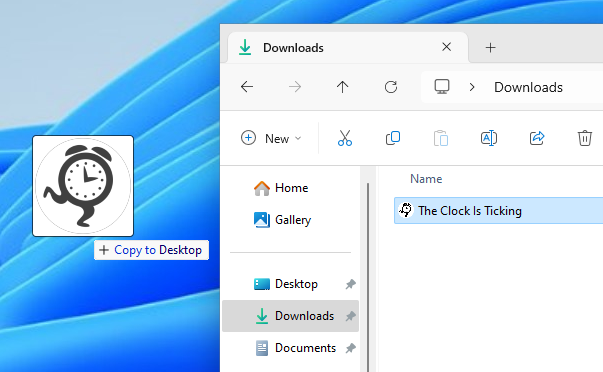 dragging and dropping to copy The Clock Is Ticking from the Downloads folder to the Desktop on Windows